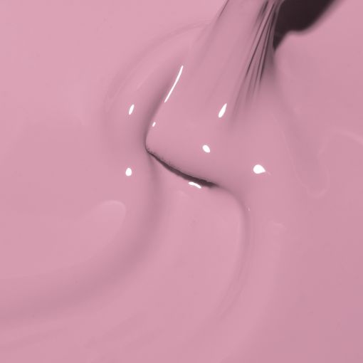 Nahaufnahme von rosa Farbe, die mit einem Pinsel aufgetragen wird